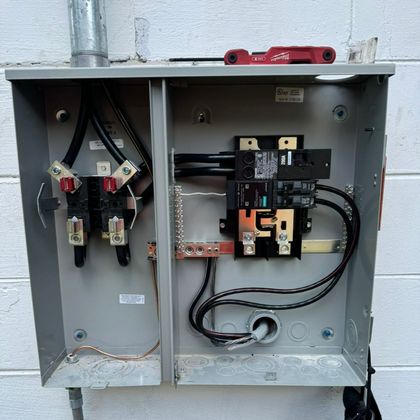 Meter Main Electrical Service 200 Amp - Palatka, FL - Davis Electric Services LLC A electrical box with a screwdriver on top of it
