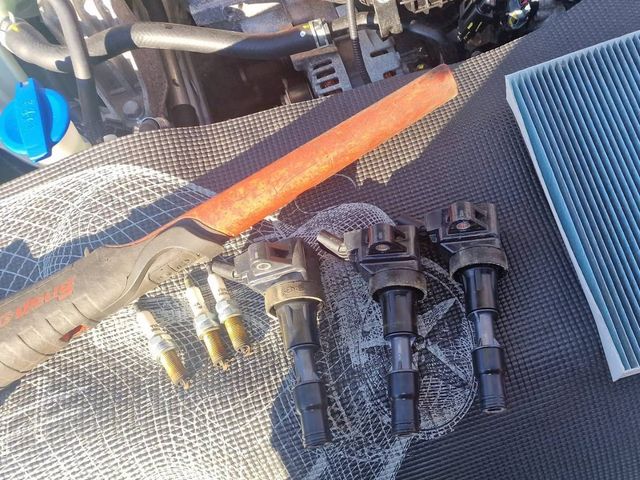 Spark plugs, ignition coils and filters replaced during a car service in Nuneaton