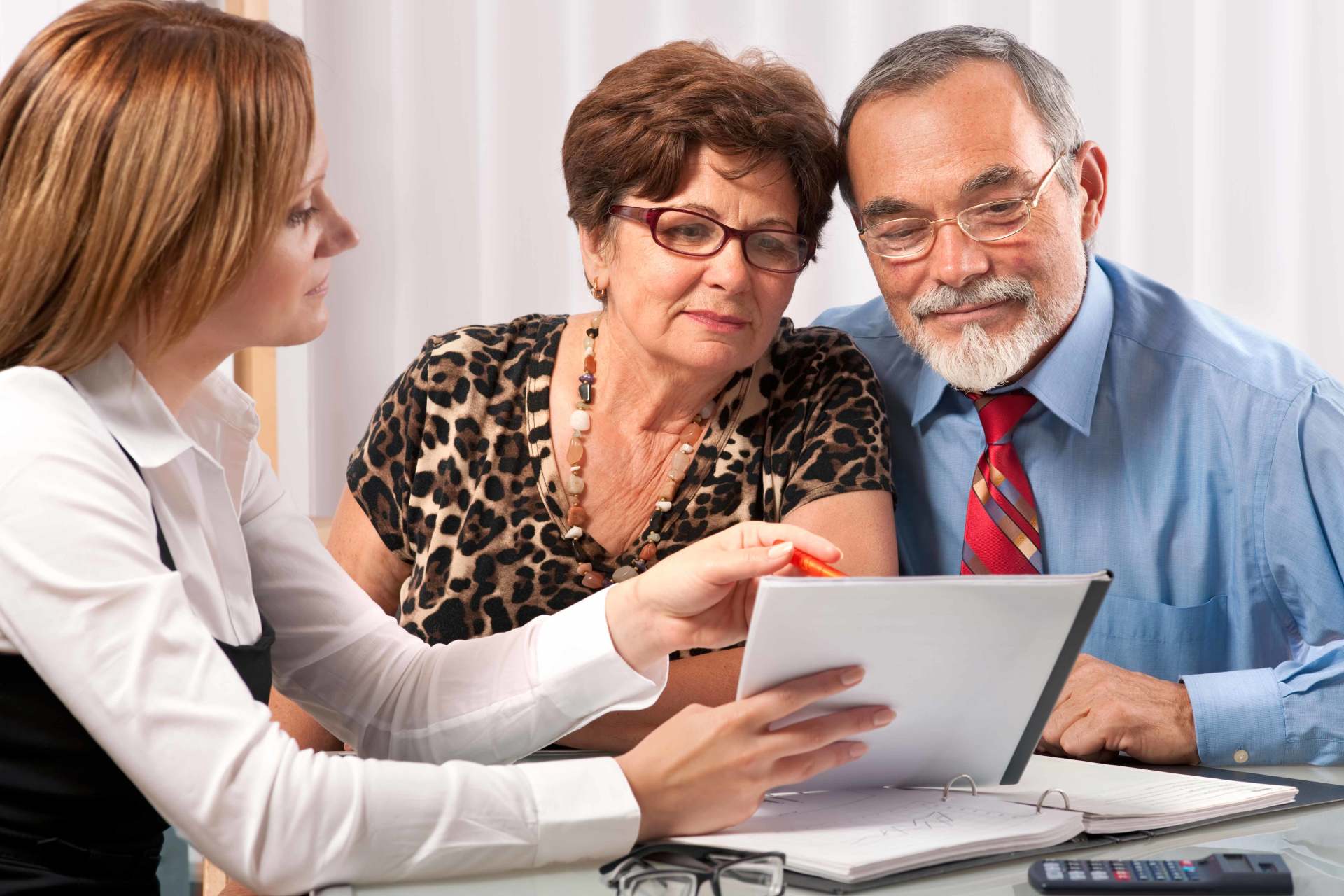 Elders Talking to a Life Insurance Agent — Miami, FL — American Quality Assurance Group