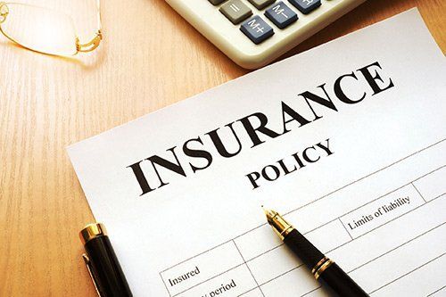 Pen Over the Insurance Policy Form — Miami, FL — American Quality Assurance Group Pen Over the Insurance Policy Form — Miami, FL — American Quality Assurance Group