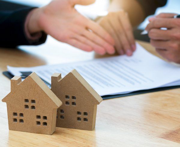 Client Signing for a Residential Insurance — Miami, FL — American Quality Assurance Group Client Signing for a Residential Insurance — Miami, FL — American Quality Assurance Group