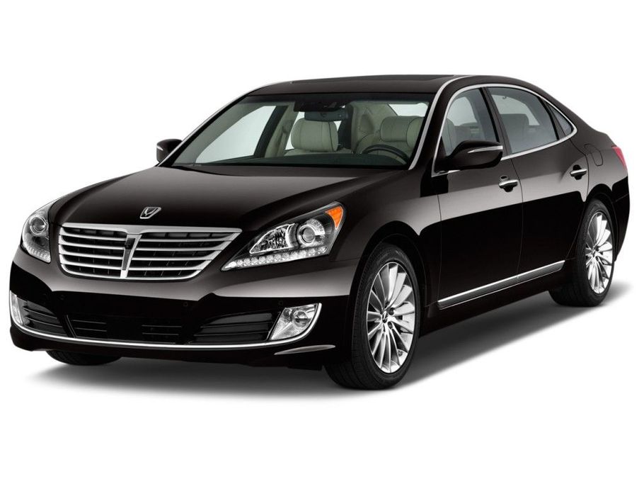 Black Cadillac sedan on a white background, front three-quarter view