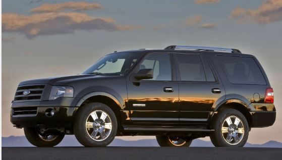Black Chevrolet SUV on a white background, front three-quarter view
