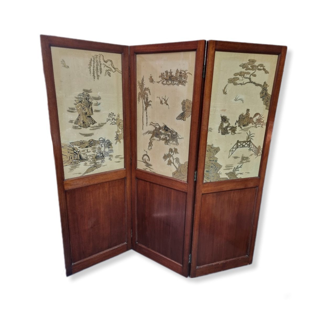 Elegance and sophistication radiate from this grand Chinese screen/room divider. Crafted in the early 20th century in Hong Kong, this piece stands 6ft tall and features three glazed panels with beautiful painted silk. It is made of mahogany wood and has been decorated with gold leaf paint for a luxurious touch. This large screen/room divider can be used to stylishly divide any area, adding a touch of classic Chinese charm to your interior. Though the panels may have some foxing, it is still sturdy and functional. This timeless piece will become the center of attention in your home. Condition report: All round very good condition with minor signs of wear & age. Some minor losses to gold leaf decoration and minor foxing to silk panels.