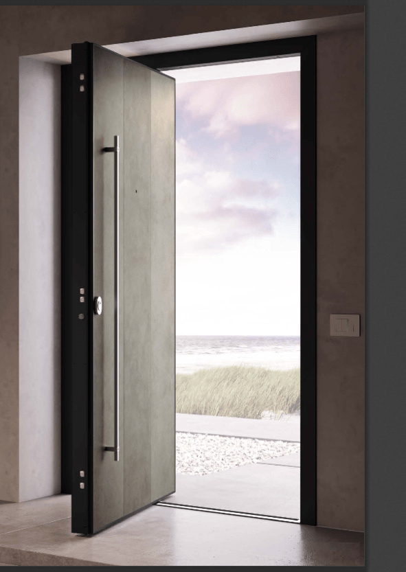 La moderna porta d'ingresso si apre su una luminosa vista sulla spiaggia oltre la soglia