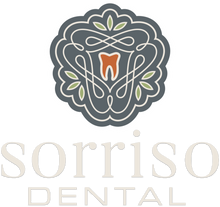 A logo for sorriso dental with a tooth in the center