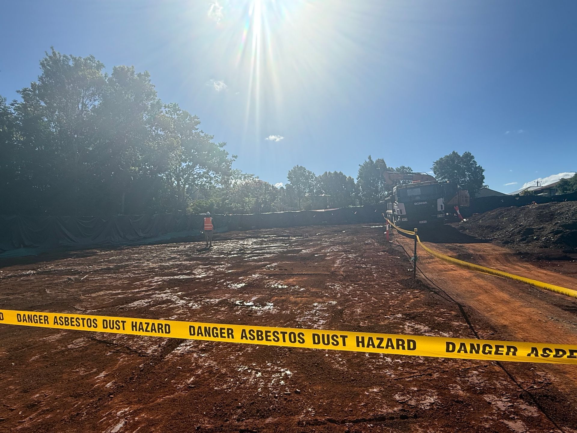 Caution Tape Around a Dirt Excavation Site — Lifestyle Demolition In Murwillumbah, NSW