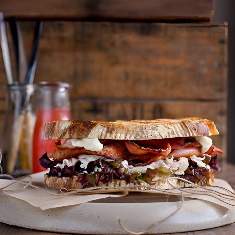 A Close Up of a Sandwich on a Cutting Board — Corrado & Frank Distributors in Fairy Meadow, NSW