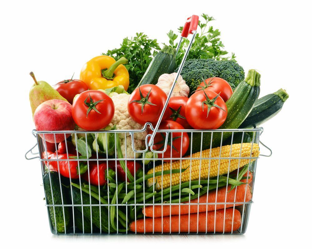 A Shopping Basket Filled With Fruits and Vegetables on a White Background — Corrado & Frank Distributors in Illawara, NSW