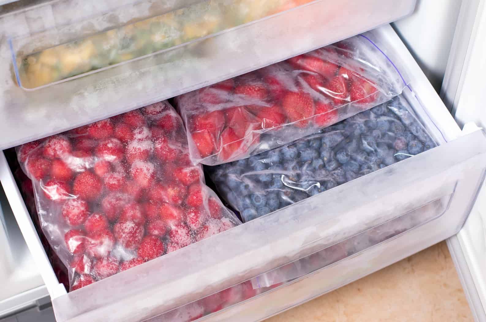 A Freezer Filled With Bags of Frozen Berries and Fruit — Corrado & Frank Distributors in Fairy Meadow, NSW