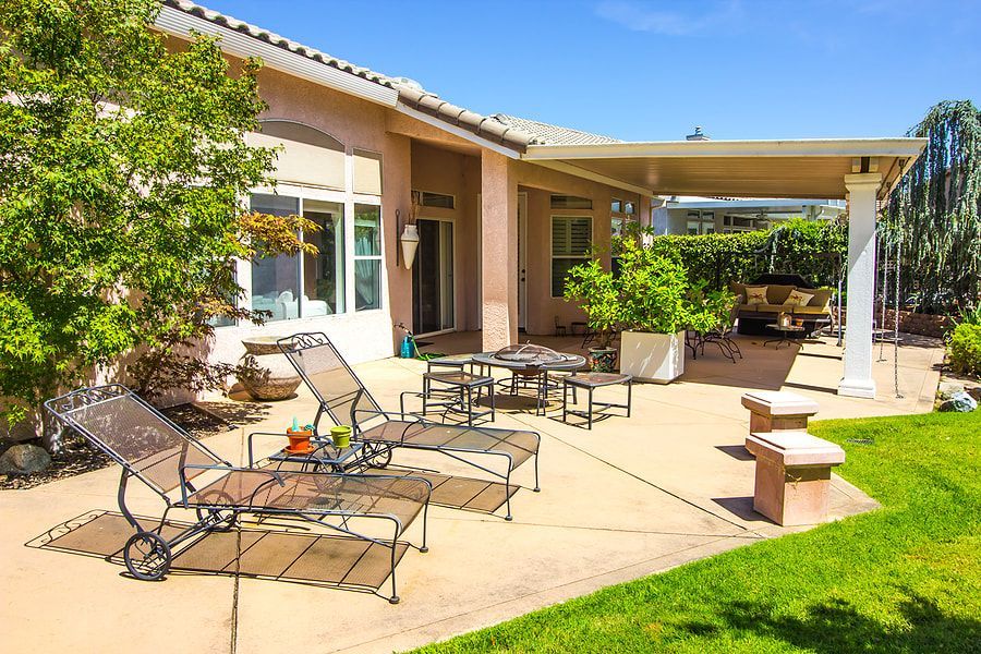 Picture of a concrete patio in a backyard