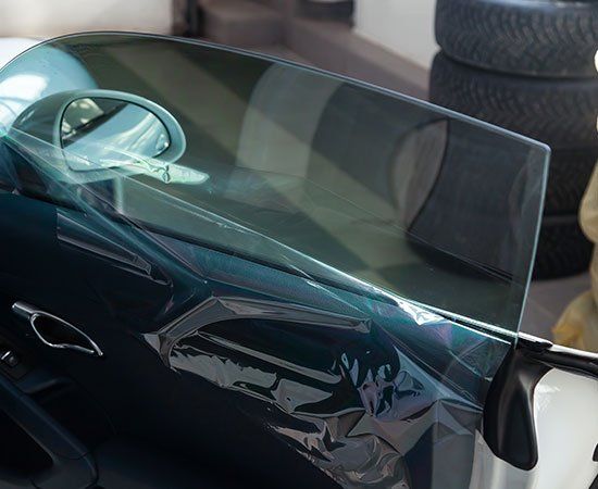 Amazing Applying Tinting Foil — El Monte, CA — True Auto Werx Tint Specialist Amazing Applying Tinting Foil — El Monte, CA — True Auto Werx Tint Specialist