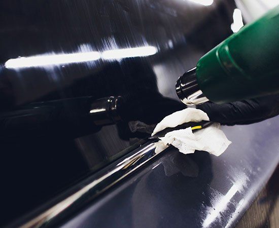 Applying Tinting Foil — El Monte, CA — True Auto Werx Tint Specialist