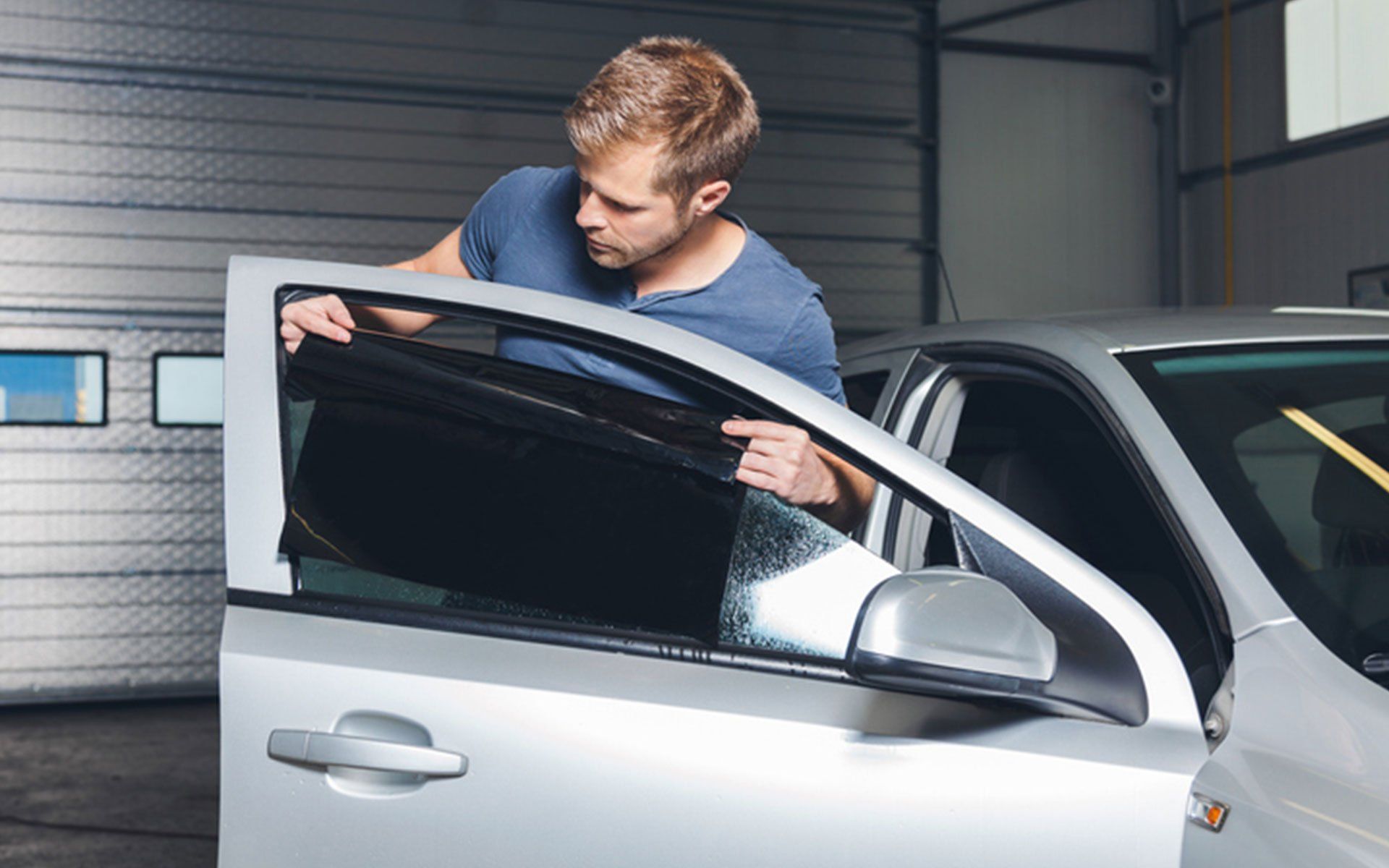Applying Window Tint — El Monte, CA — True Auto Werx Tint Specialist