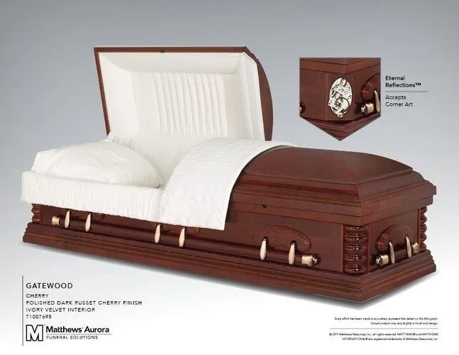 Open wooden casket with white interior, lid partially open.