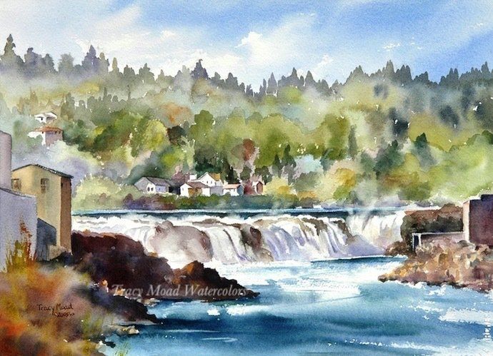 Watercolor of a waterfall with buildings and trees. Blue and white water, green and brown foliage, sunny sky.