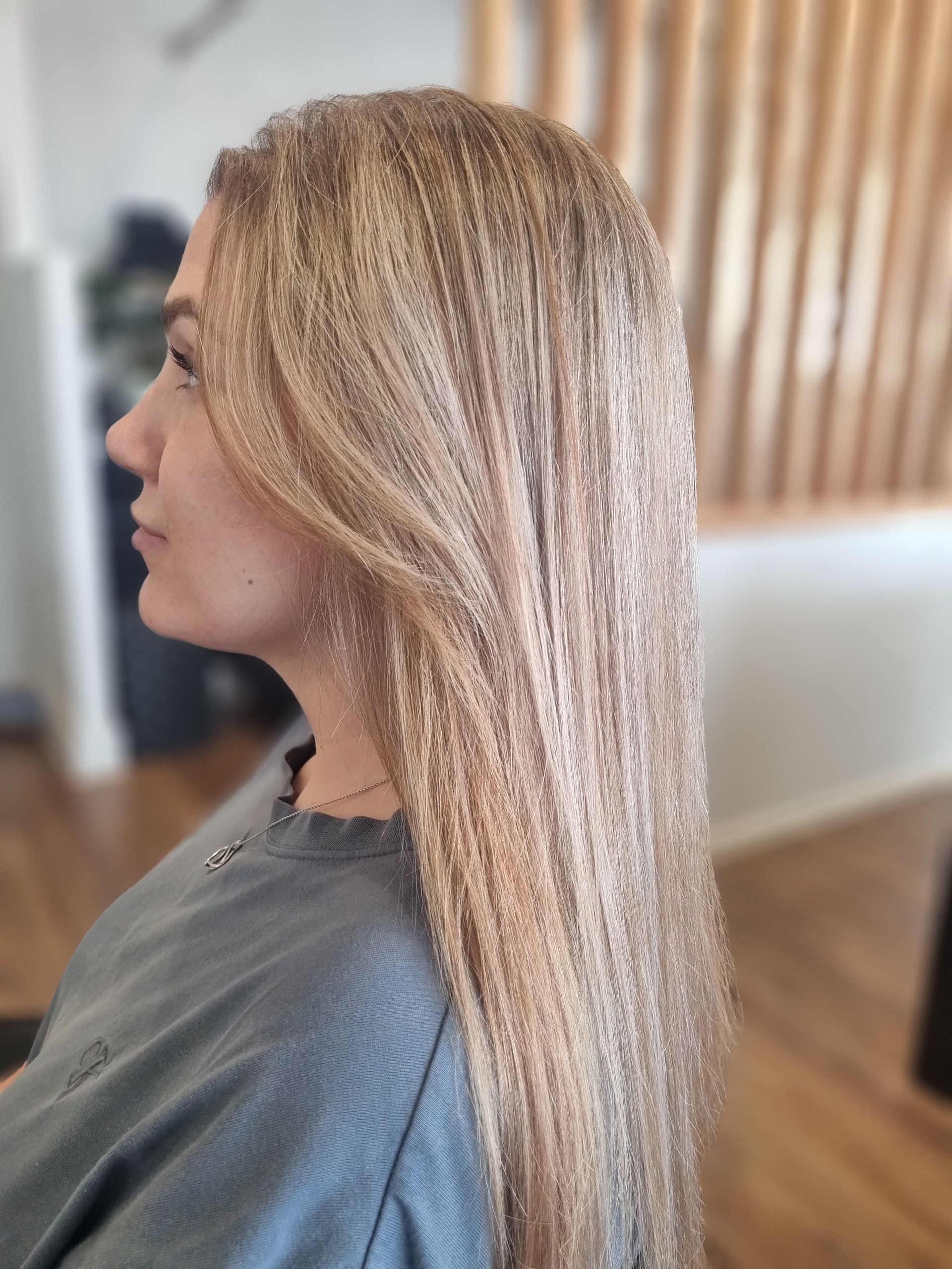 Smooth blonde hair colour and precision cut by Ballarat Hairdressers.