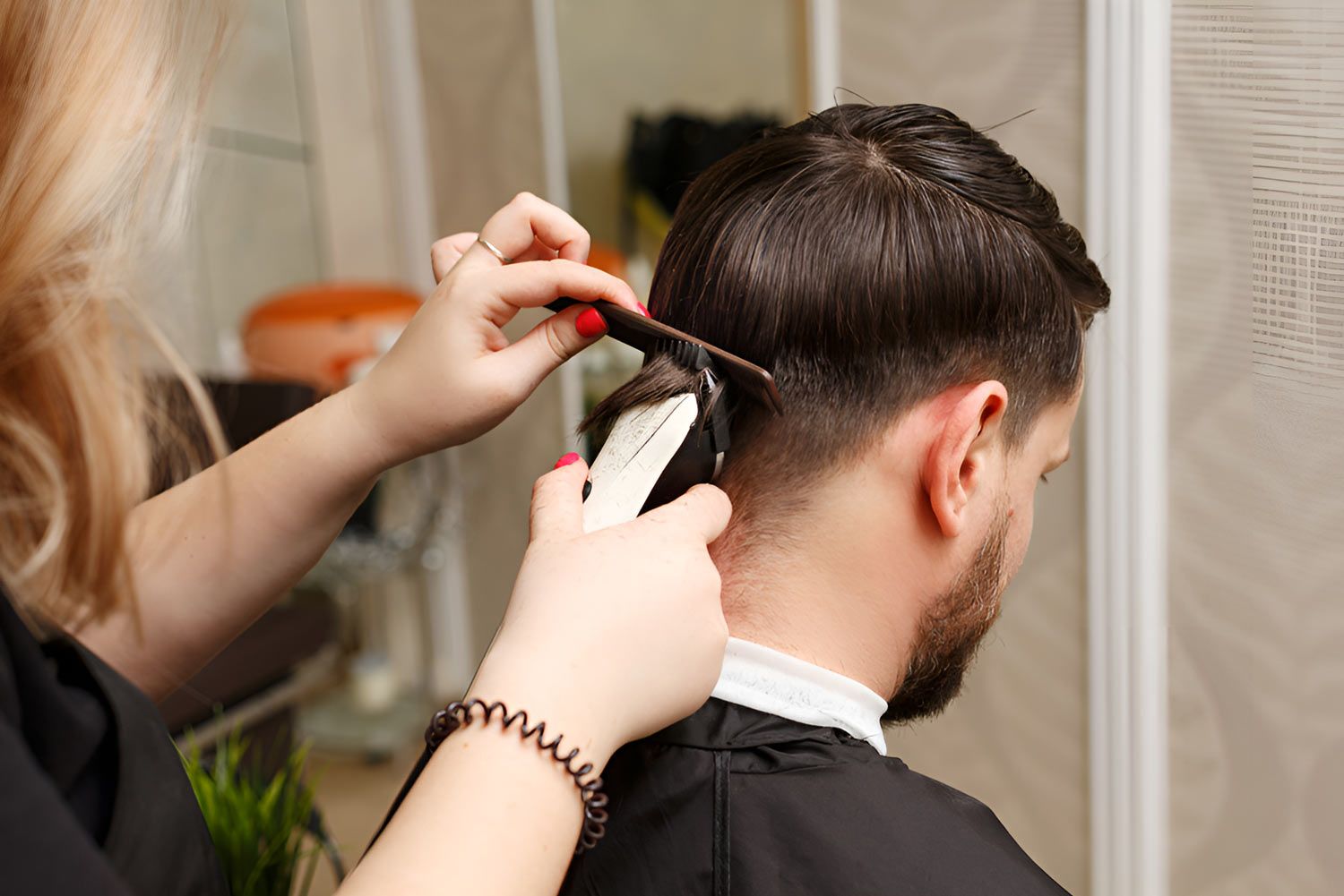 Professional Hairdresser Doing Haircut Men's Hair — Arabella Hair Design in Sebastopol, VIC