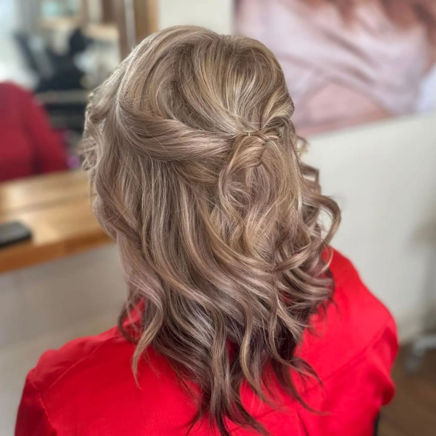 Soft half-up hairstyle with curled ends created by Ballarat Hairdressers.