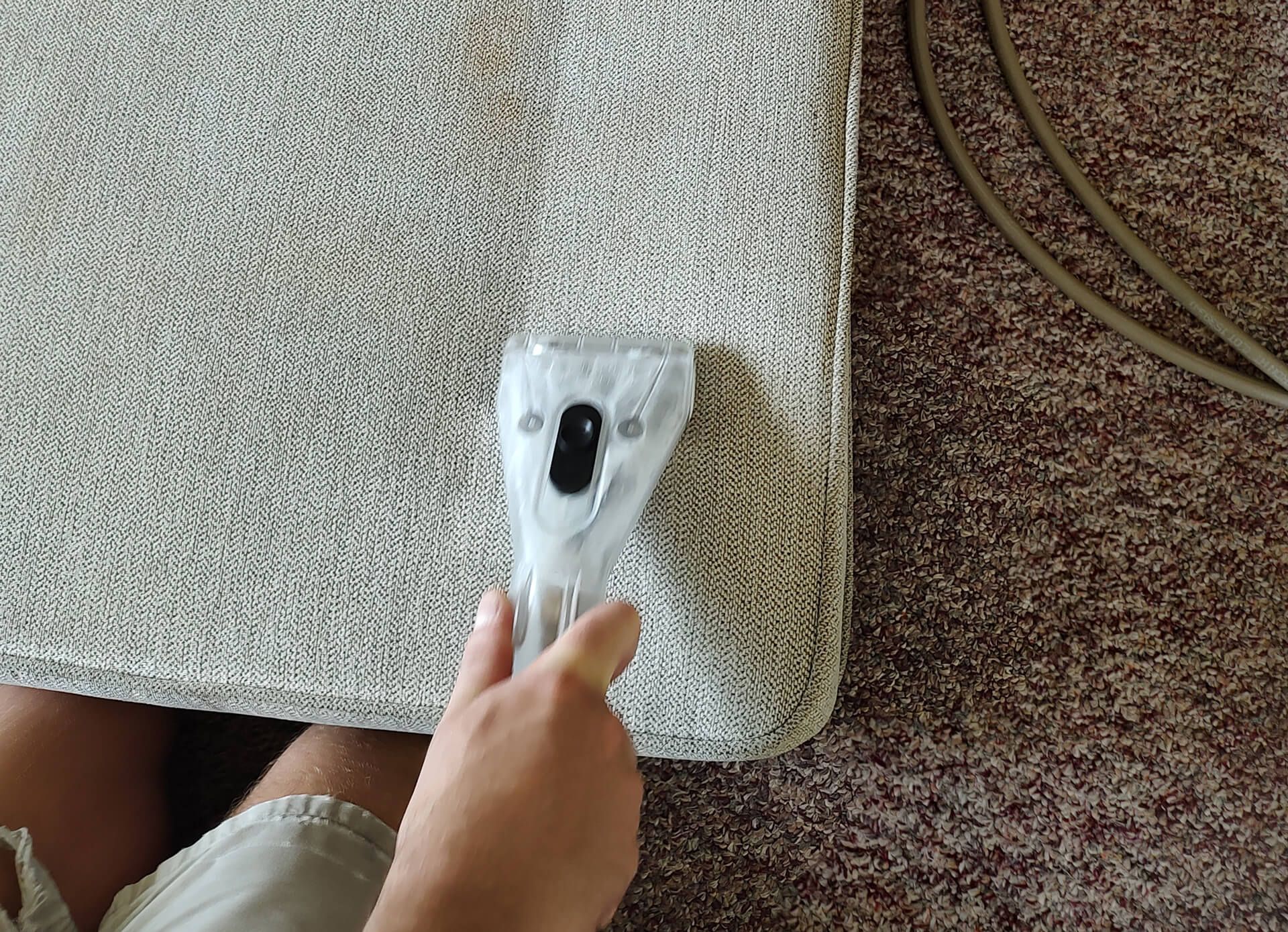 upholstery steam cleaning on a couch cushion