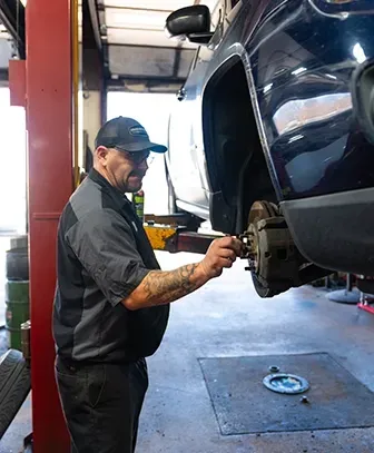 Technician at work in garage | Jerry's Auto Repair