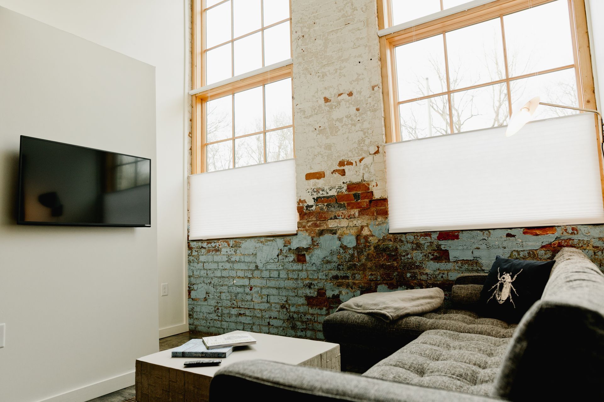 Sectional sofa with TV in boutique hotel livingroom