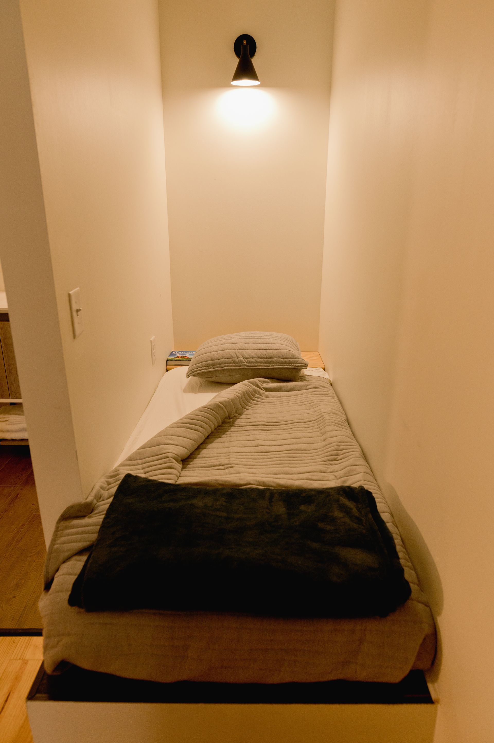 Twin size floating boutique hotel bed