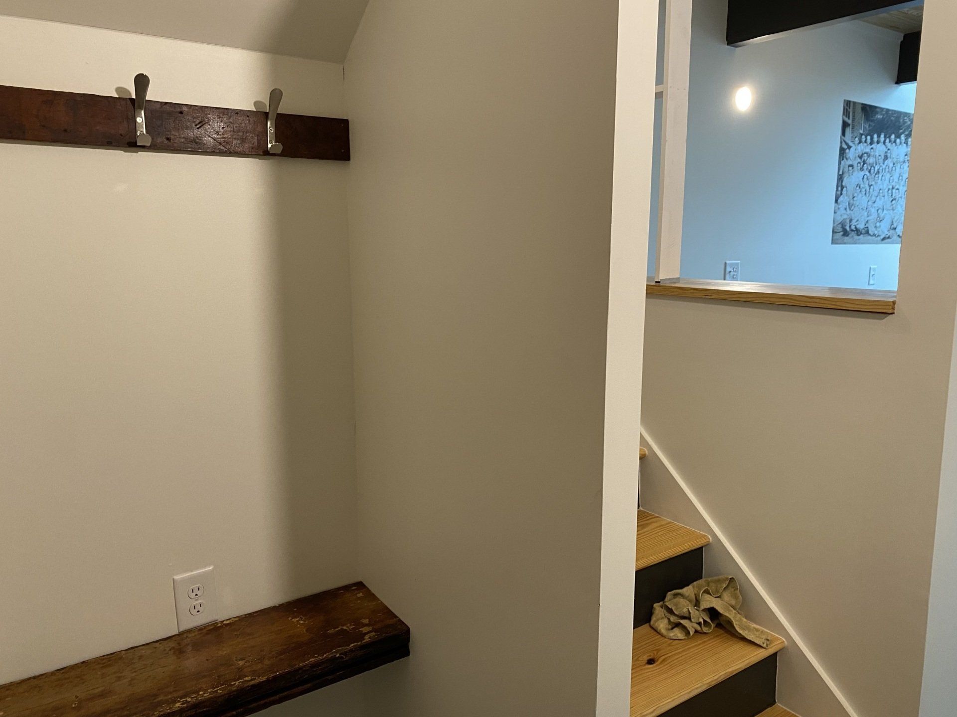 Hotel mudroom for shoes and coat rack