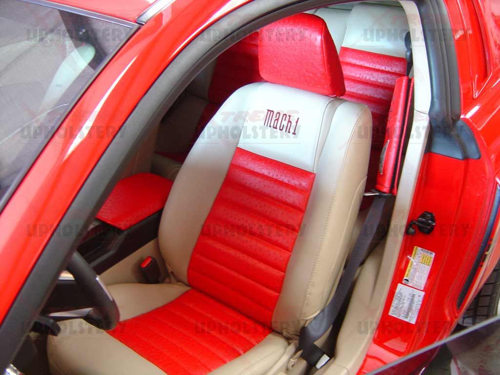 Red car interior with red and white racing-style front seats