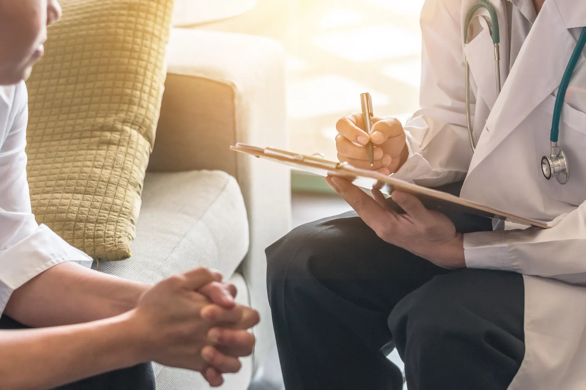 A healthcare professional consulting with a patient.