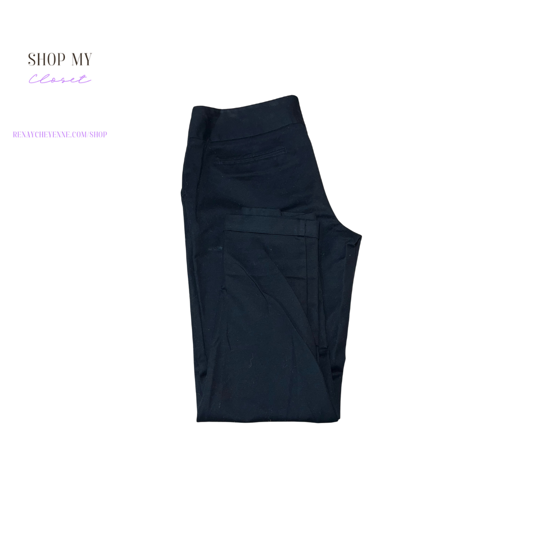 A pair of black ankle length dress pants from Worthington. The pants are size small 12 and have a flattering fit. The fabric is wrinkle-resistant and made of 97% polyester and 3% spandex. The pants are perfect for a day at the office or a night out on the town.