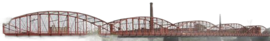 A reddish-brown metal bridge spans across water, with a high arching structure.