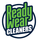 Logo for Ready Wear Cleaners with green text inside a navy blue circle.