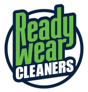 Logo for Ready Wear Cleaners with green text inside a navy blue circle.