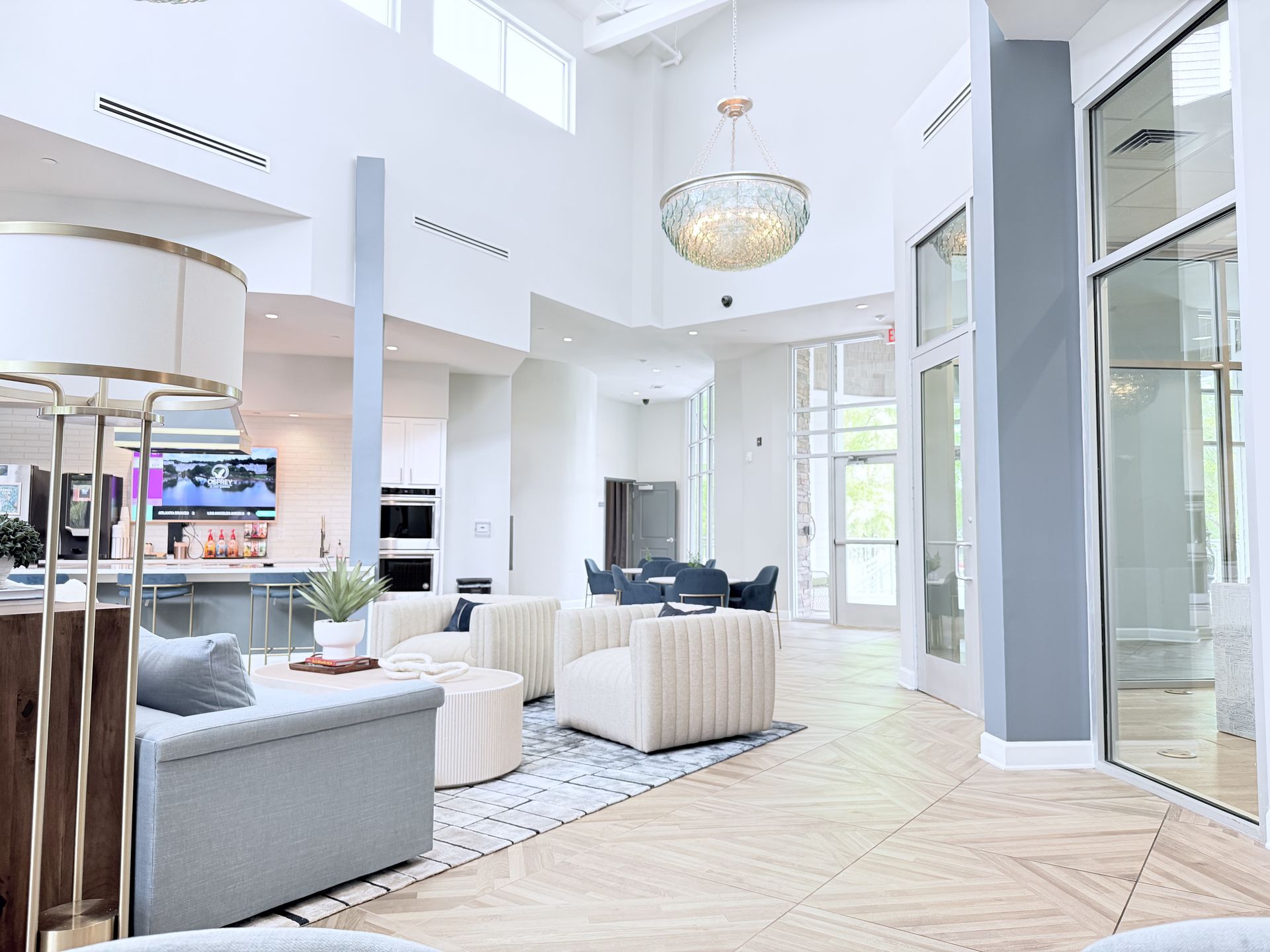 A bedroom with a bed and a ceiling fan