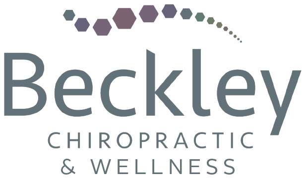 The logo for beckley chiropractic and wellness is gray and purple.