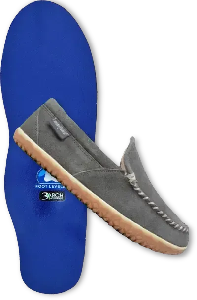 A pair of shoes next to a pair of blue insoles