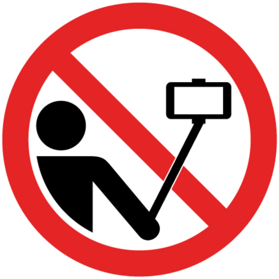 No selfie icon: black person holding a selfie stick crossed out by a red prohibition symbol