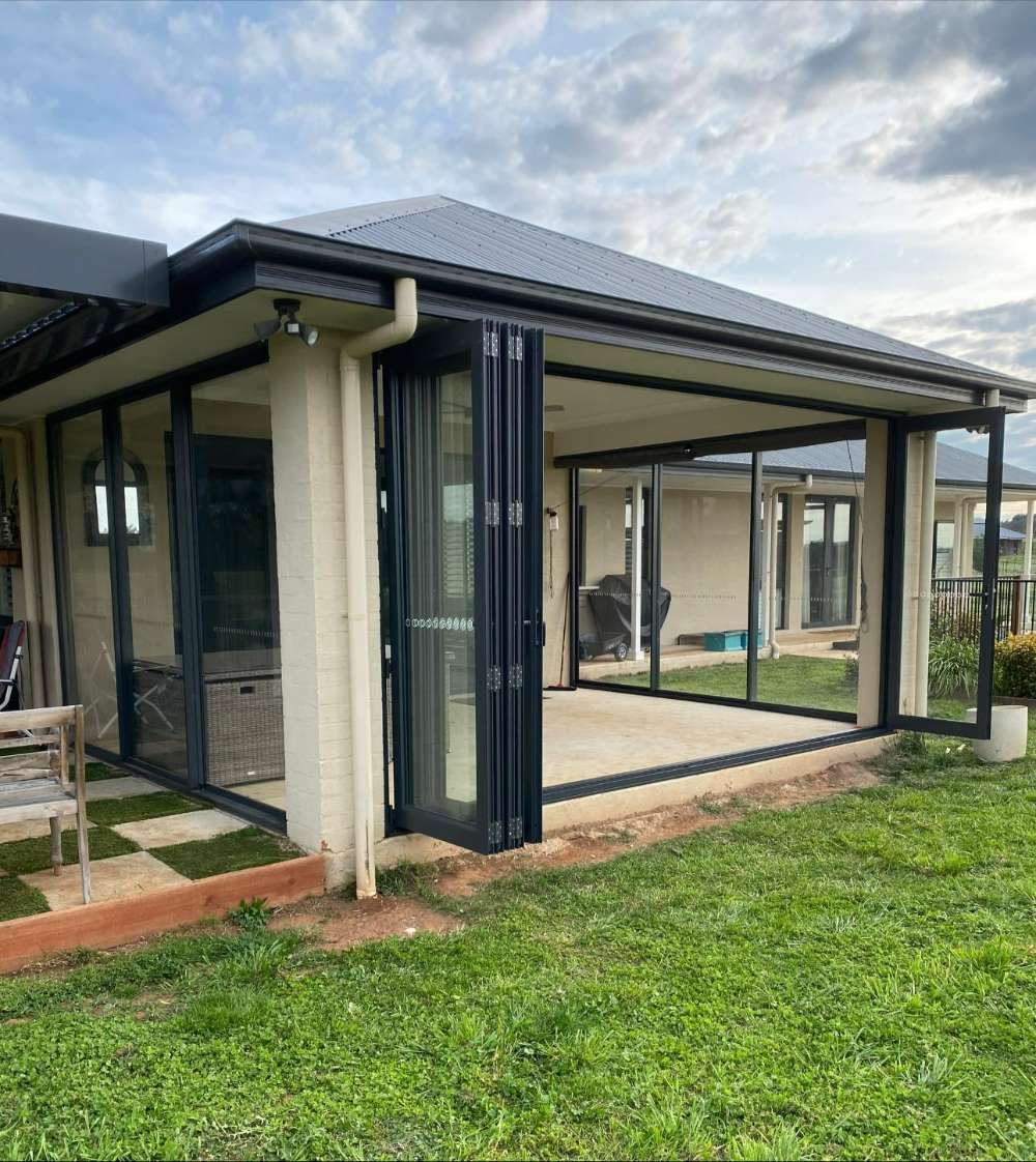 A House With a Patio and Sliding Glass Doors — All Things Windows & Doors in Goulburn, NSW