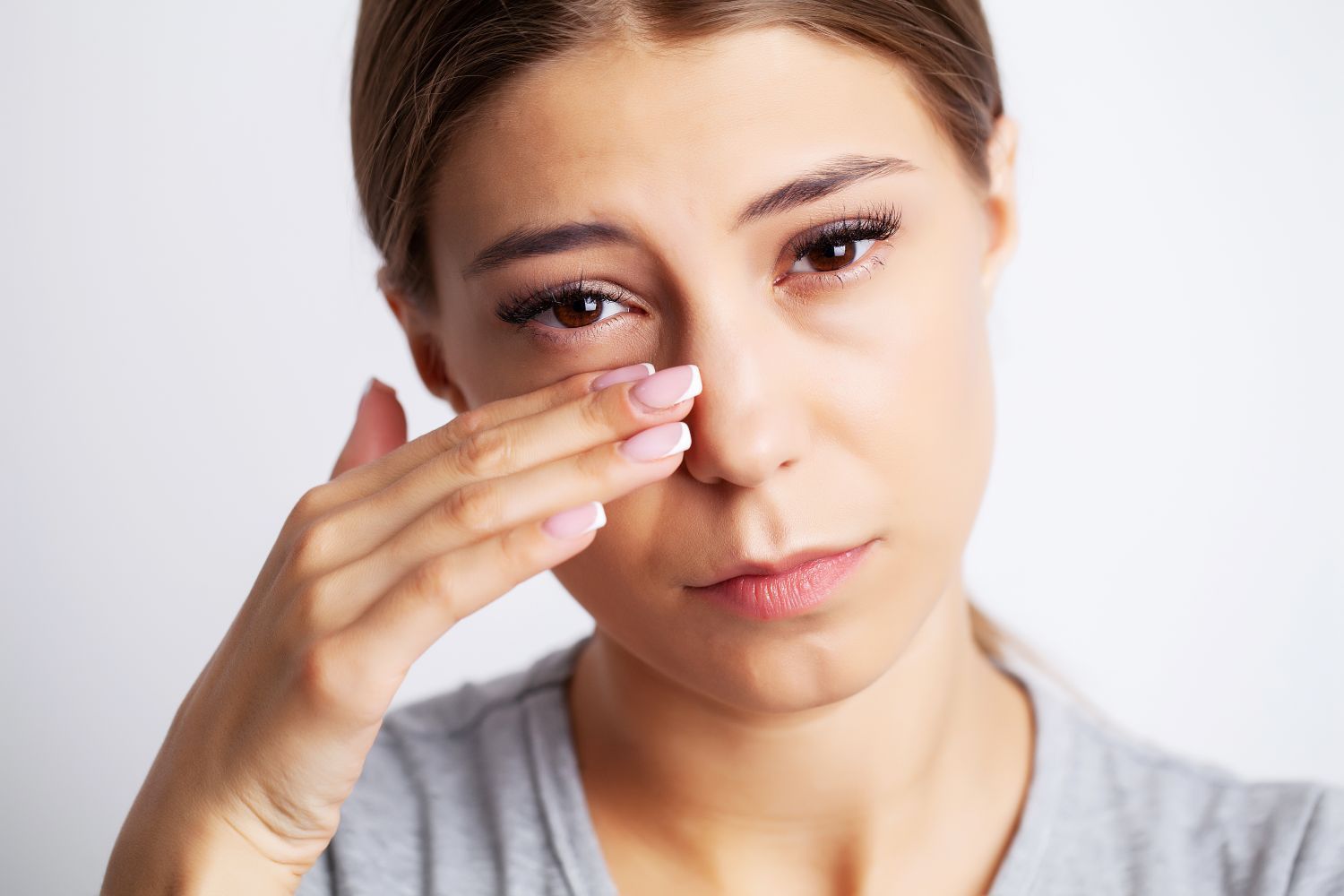 exhausted-young-woman-suffering-severe-pain-from-nasal-congestion
