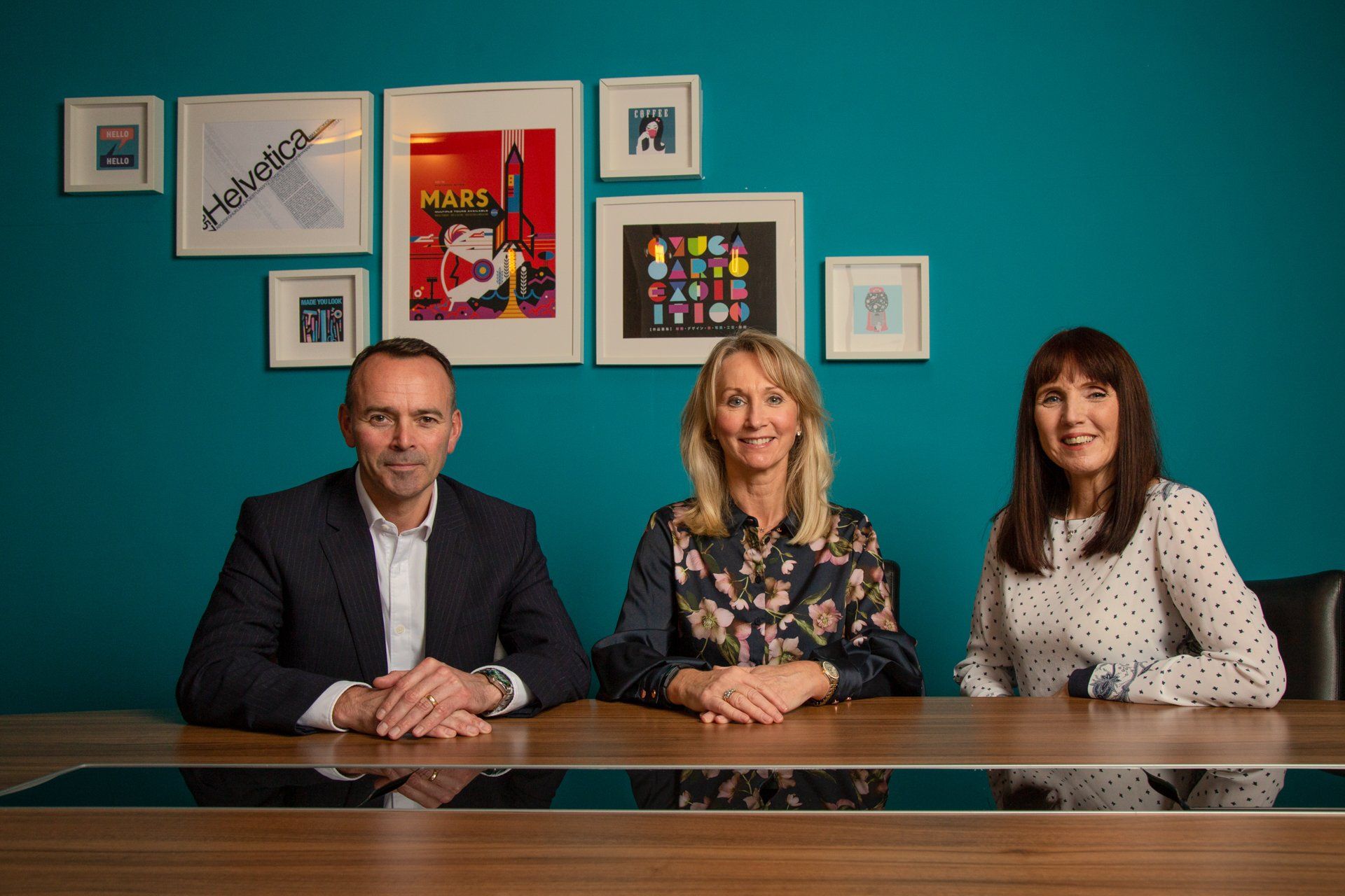 Corporate photography captures three relaxed Directors in Leeds