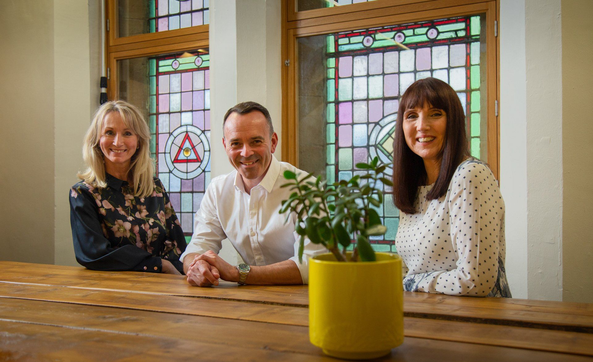 Corporate photography captures three relaxed Directors in Leeds