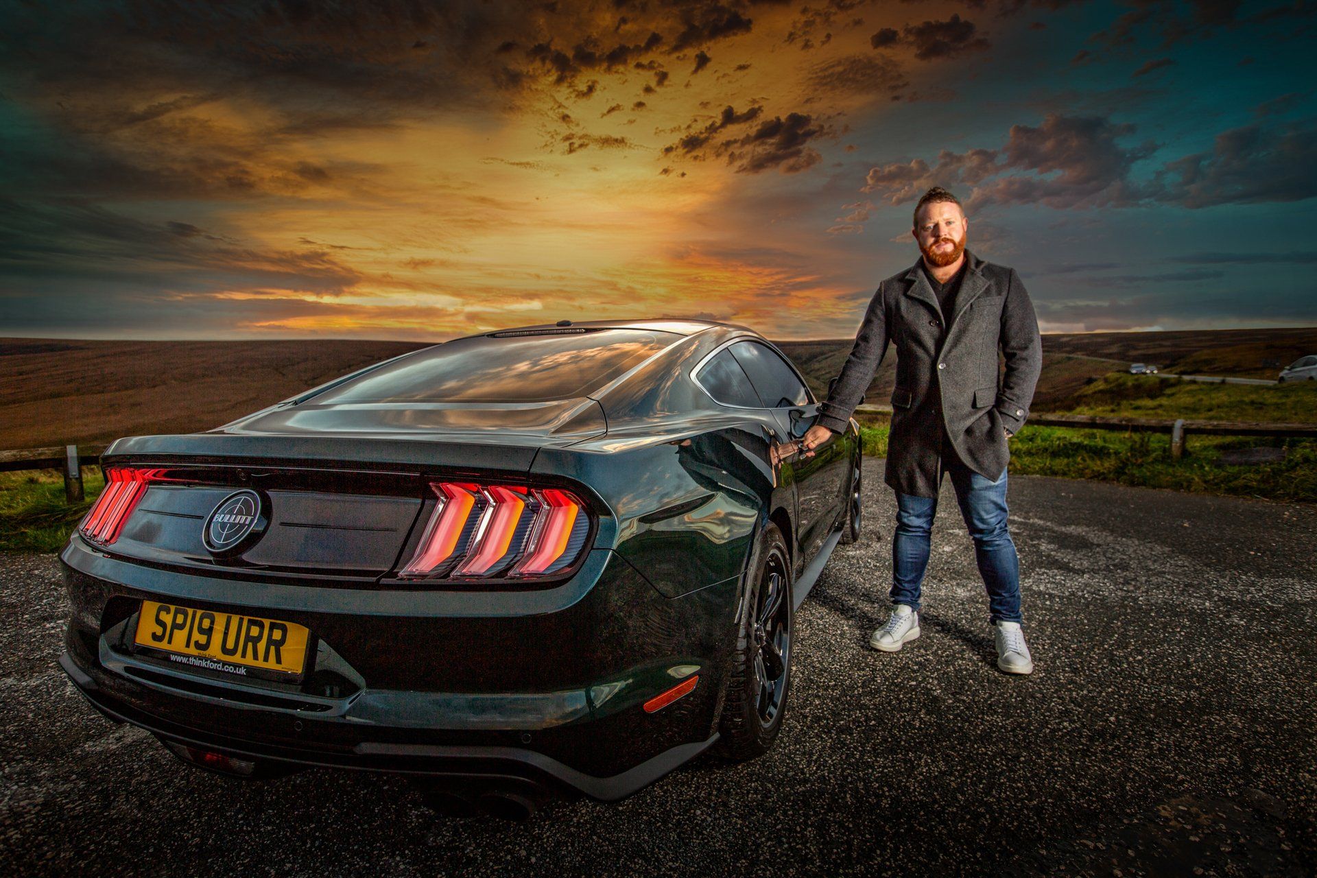 Car photographer of owner beside Mustang Bullitt 2020 at sunset on Marston Moor, Huddersfield
