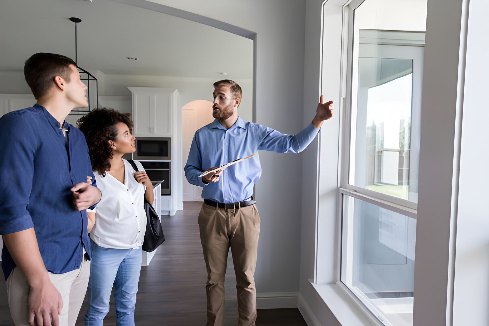 A home inspection Vero Beach FL guiding clients through a modern property during a professional home tour