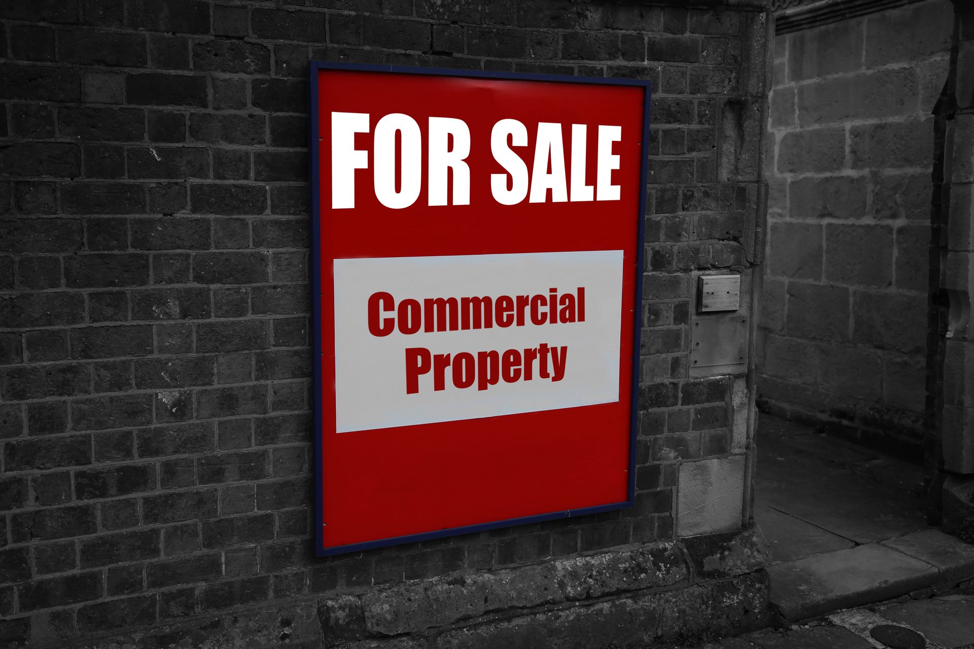 Commercial signs advertising commercial property for sale.
