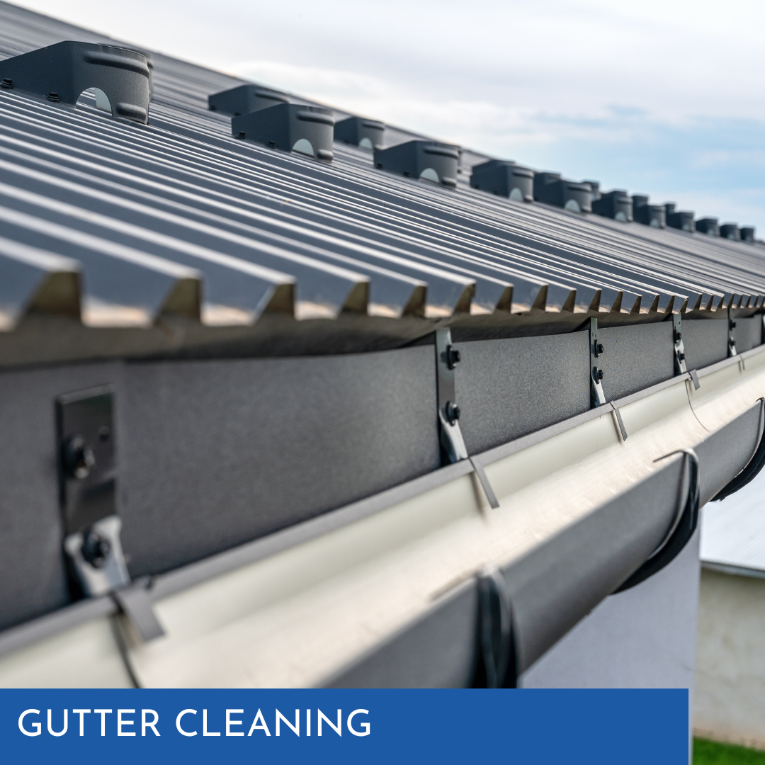 Black and white metal roof with gutters, text overlay