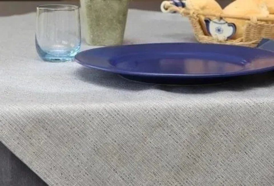grey cotton tablecloth with blue plate
