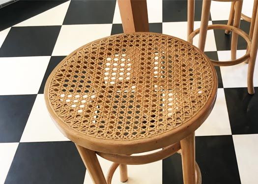 Circular caned chair seat