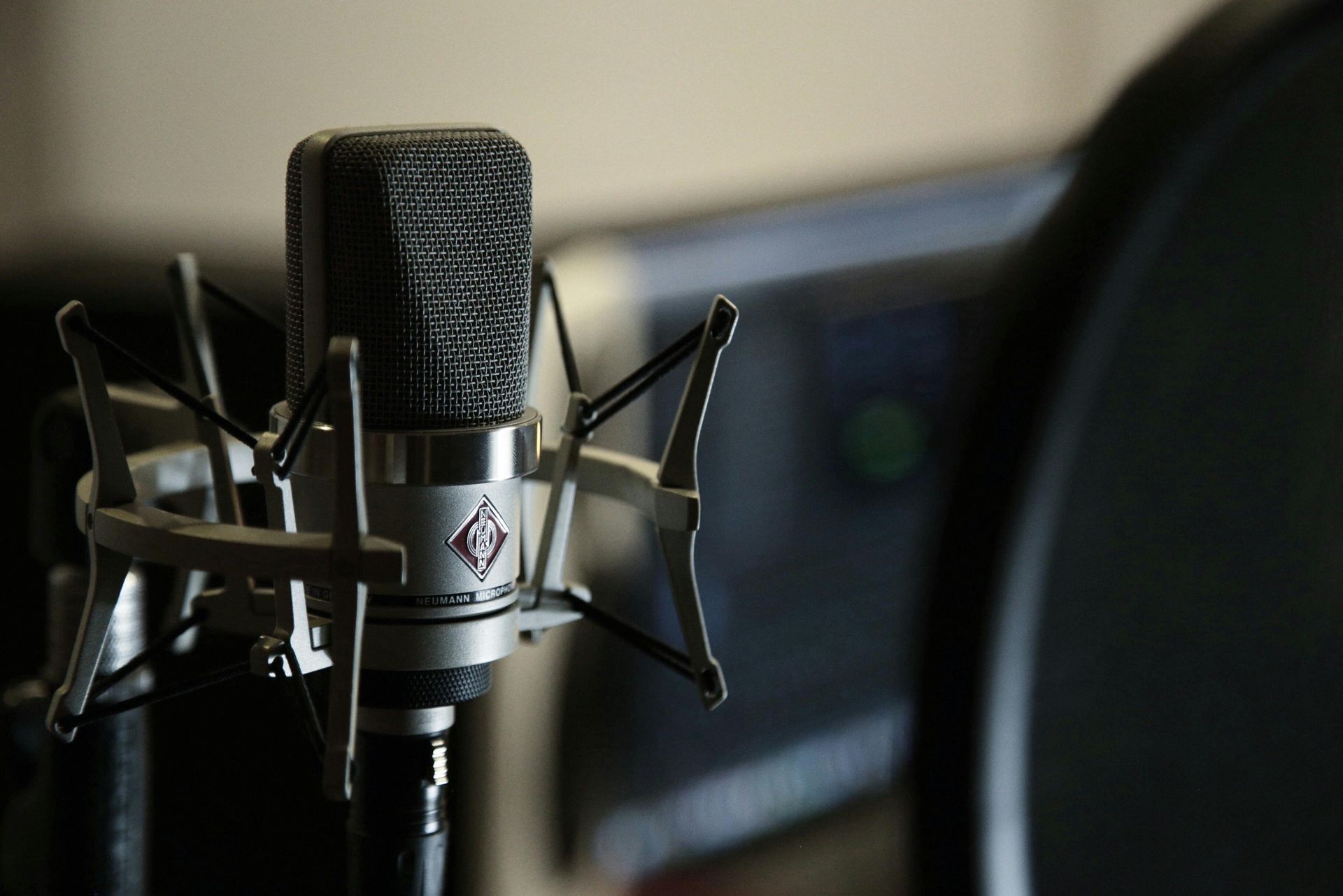 A close up of a microphone in a recording studio