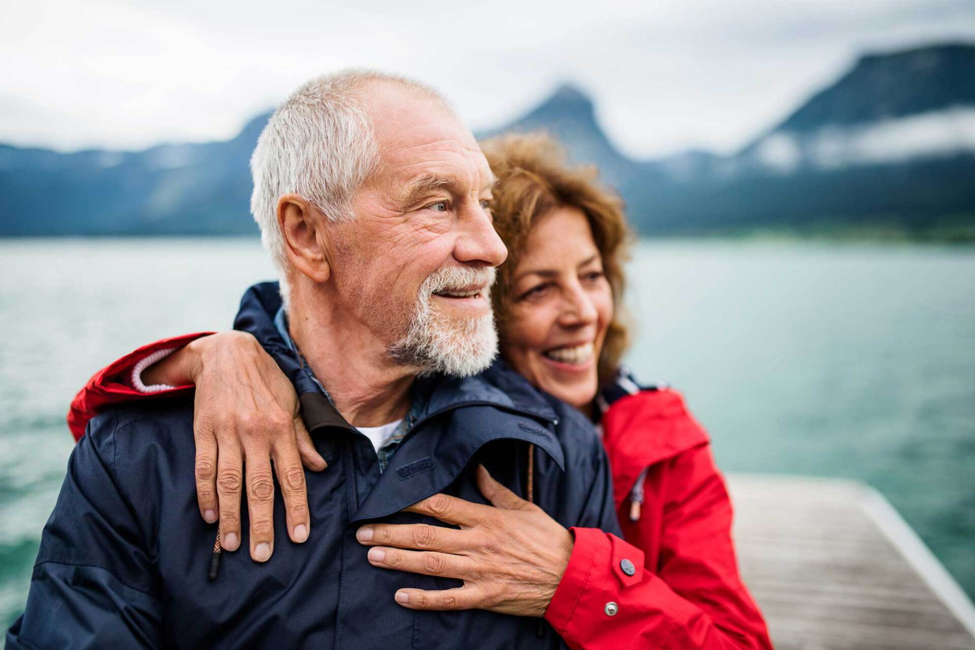 Senior Couple Tourist Standing by Lake — Missoula, MT — McNay & Messick, CPAs, PC